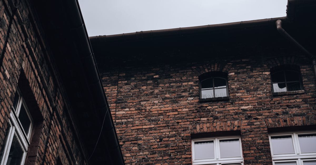 Downpipe replacement and gutter realignment on a brick veneer family home